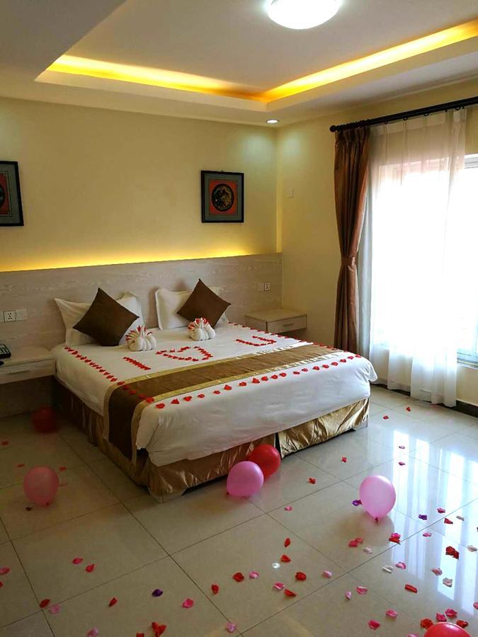 Nanjing Restaurant & Motel Kampala Habitación foto